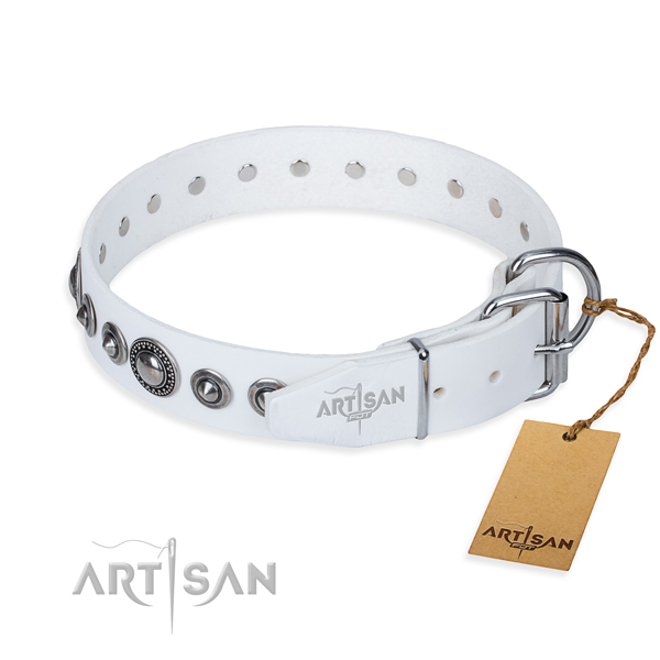 Full grain leather dog collar made of gentle to touch material with corrosion resistant adornments