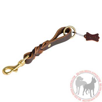 Leather dog leash pull tab for managing large canines